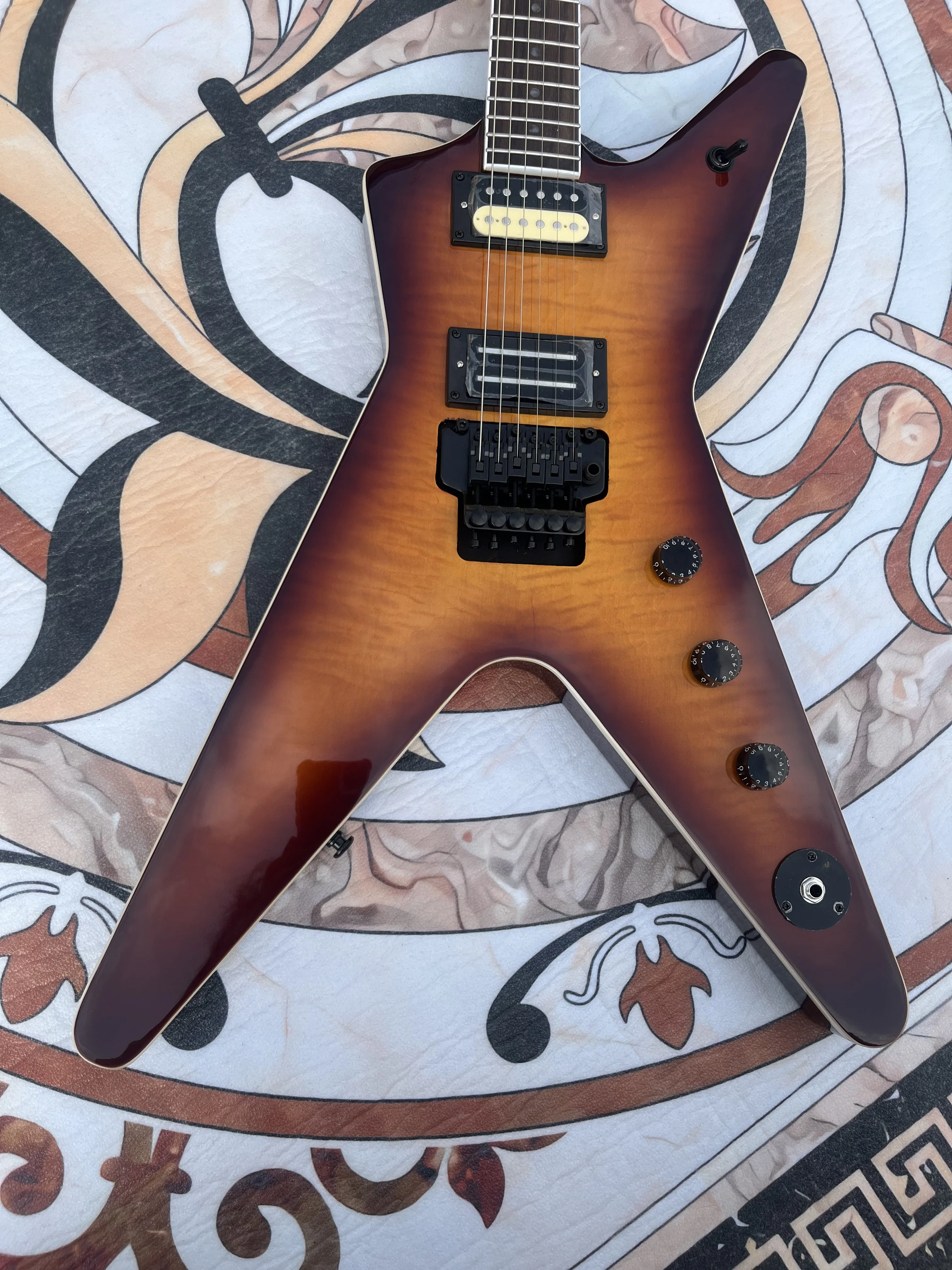 

Chinese Electric Guitar Flame Maple Top Flying V Tremolo System guitar Strap 6 String