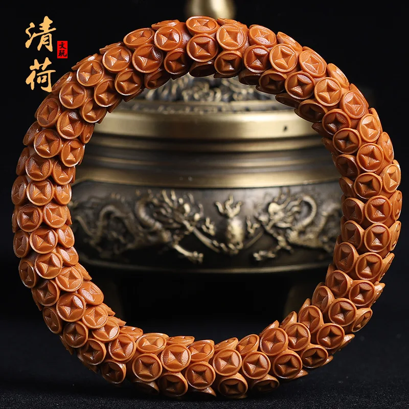 

Nut Gold Hand Carved Hollow Money Bowl Olive Hu Stone Carving Amusement Article Bracelet Men and Women