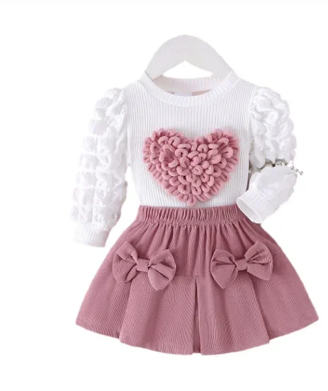 Conjunto de roupas para meninas, manga bufante, patchwork canelado, padrão de coração, tops + saia plissada com laço, conjuntos de duas peças para roupa de bebê de 0 a 3 anos