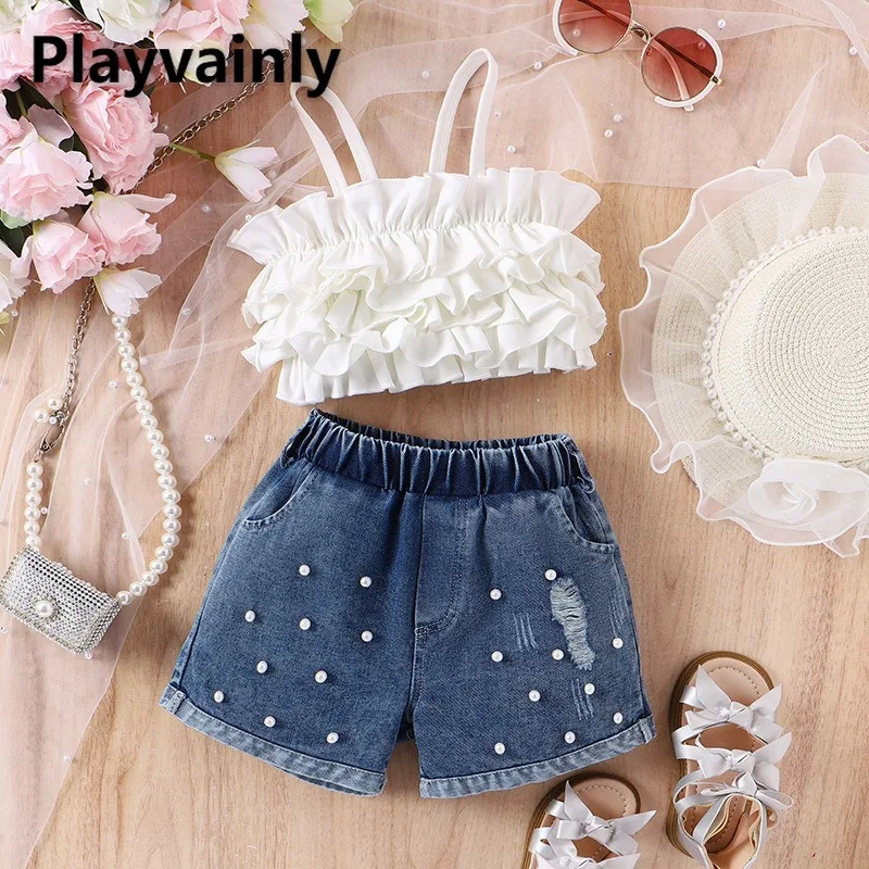 

Новый летний комплект для девочек в корейском стиле, 2 предмета: белый, черный, розовый укороченный топ + рваные джинсовые шорты с бусинами, одежда для малышей D8982