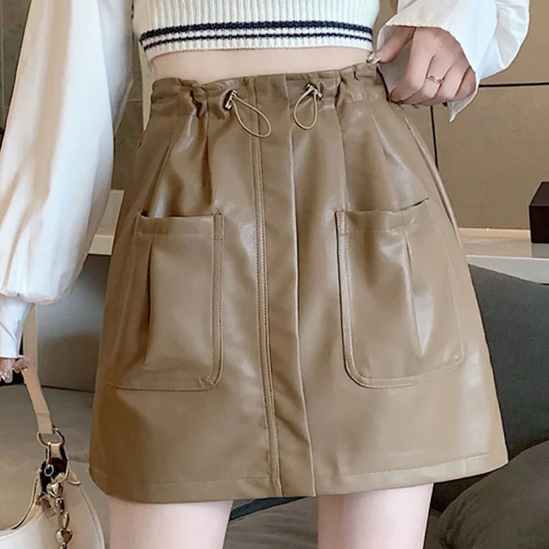 Young Style Streetwear Women Clothing Young Style Streetwear Casual Fashion Loose Solid Color Drawstring Patchwork Pocket Skirts