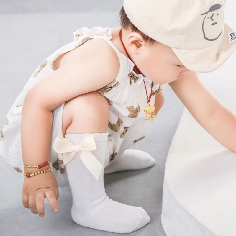 Calze sopra il ginocchio per bambini Autunno Inverno in puro cotone stile coreano con fiocco, vestibilità ampia, antivento, calzini alla caviglia per bambini