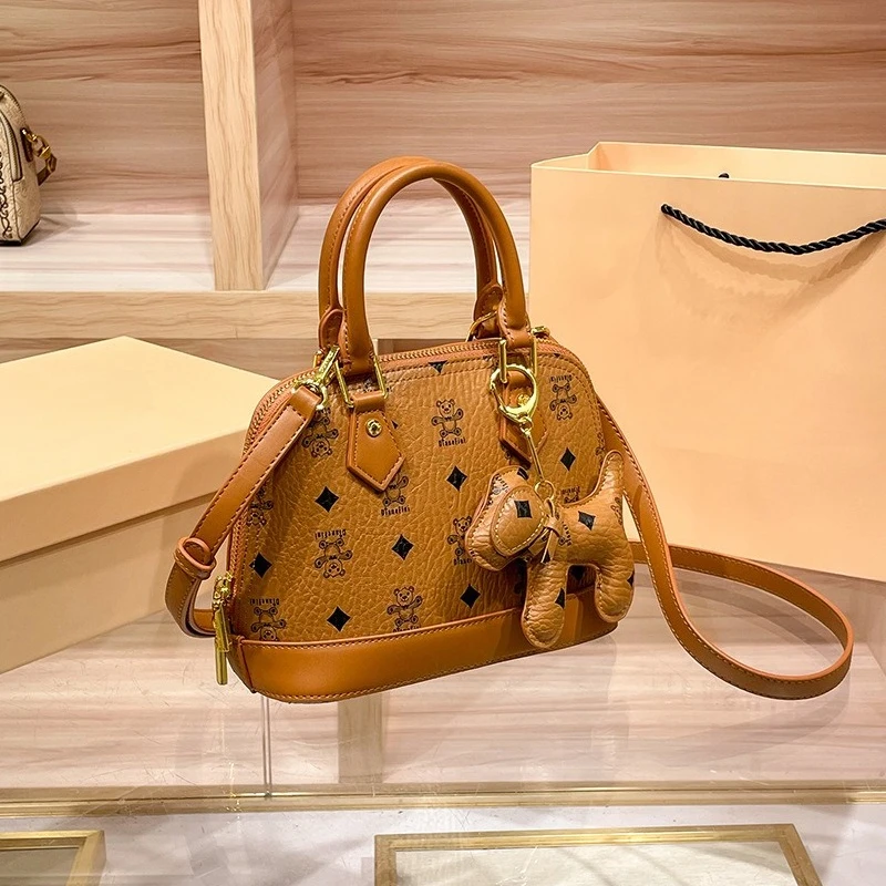 

Дизайнерская роскошная сумка для подгузников для женщин, элегантная сумка через плечо, минималистичная кожаная сумка-тоут в винтажном стиле, вместительная сумка.