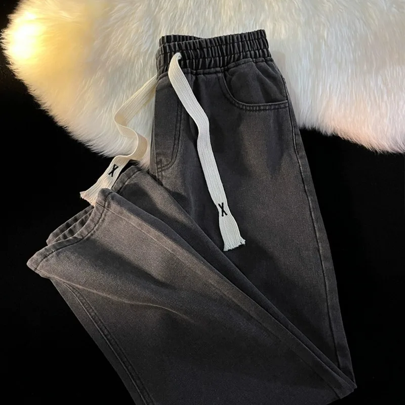 

Прямые джинсы с эластичной резинкой на талии. Мужские универсальные повседневные джинсы с завязками на талии. Свободные американские широкие джинсы.