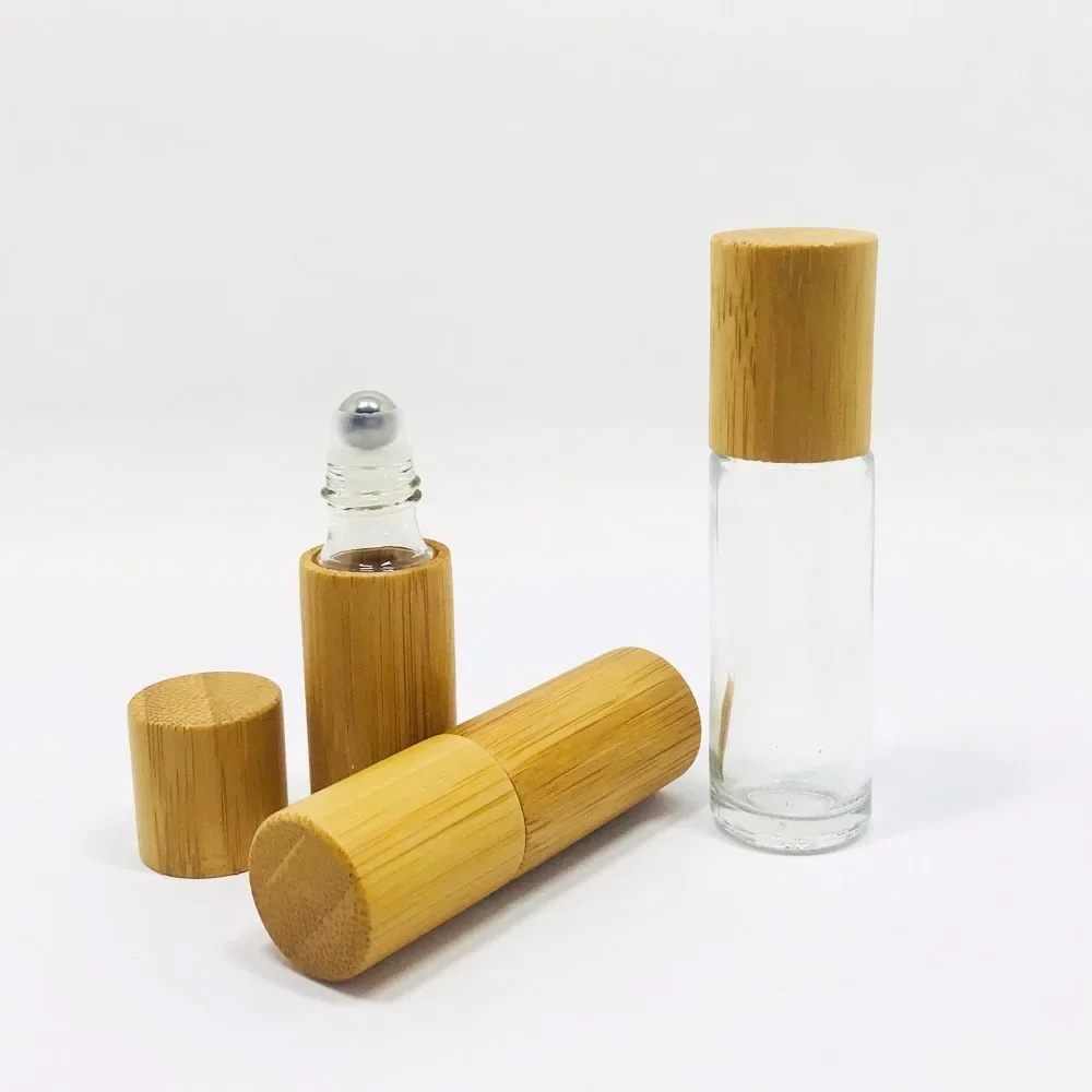 

whosesale Amber Roll On Roller Bottle for Essential Oils Refillable Perfume Bottle Deodorant Containers with wooden bamboo caps