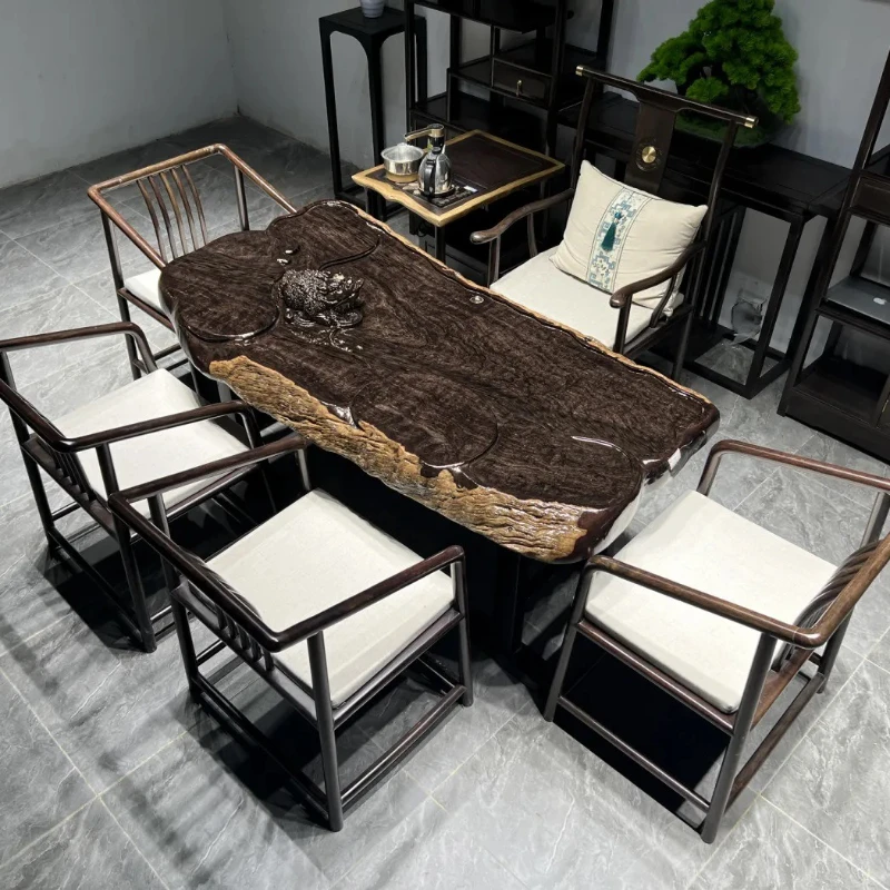 

Ebony carved log root carving new Chinese style tea coffee table solid wood household living room