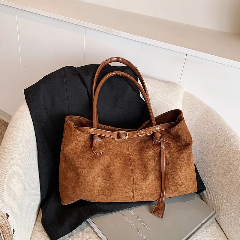 

New Matte Square Bag. A spacious, slouchy underarm tote with unique minimalist design for effortless style.