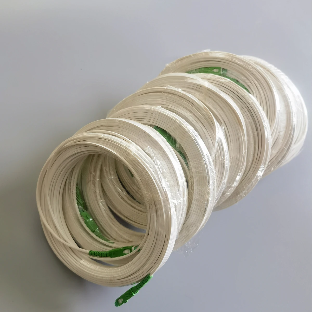 10 قطعة LSZH الألياف إسقاط كابل 20 متر/30 متر SC/APC إلى SC/APC G657A2 داخلي FTTH قطرة سلك التصحيح الحبل عرض خاص جودة عالية