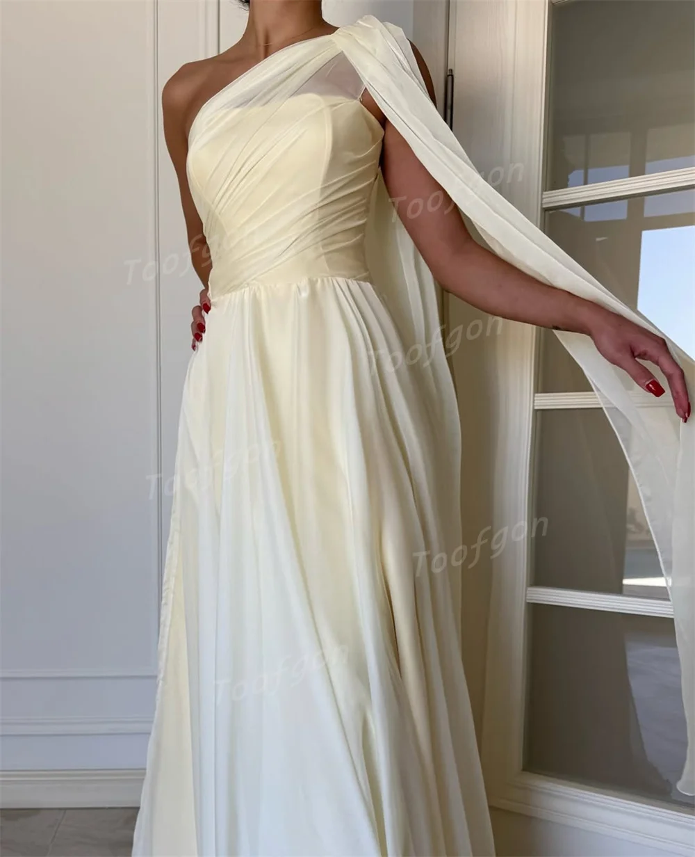 ชุดราตรีผู้หญิงสีเหลืองแบบไหล่เดียว ผ้าชีฟอง ดีไซน์หรูหรา จับจีบ สำหรับงานเลี้ยงอย่างเป็นทางการ ชุดราตรียาวสั่งตัดได้ สไตล์ซาอุดิอาระเบีย