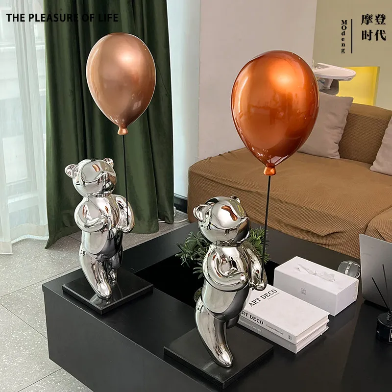 Nordic modern model home sales office: Little Bear holding a balloon sculpture ornament, children's room entryway creative