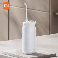 Xiaomi Mijia electric oral irrigator F400 water flosser that has a 200-ml and four modes.whitening, cleaning, waterpulse tool