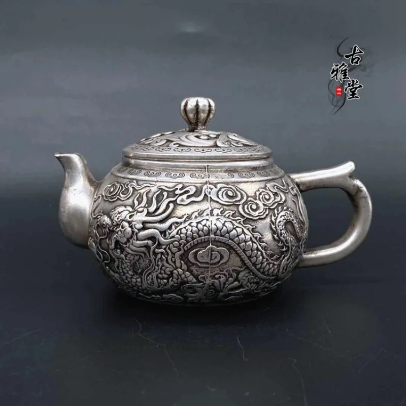 Antique , tea pet ornament, and phoenix auspicious relief small copper teapot, "Dragon Travels the World" co