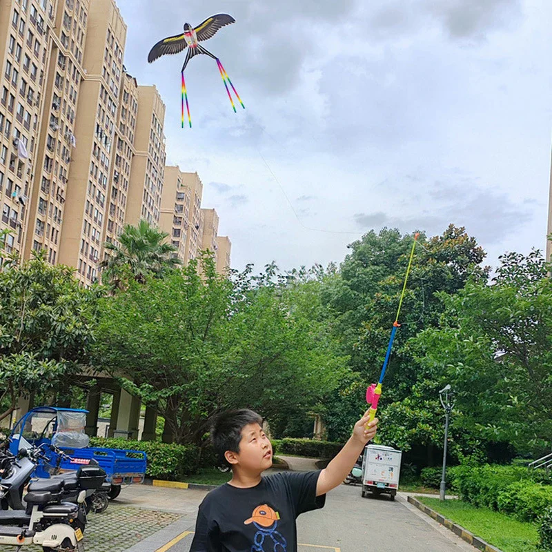 2025 Nuovi bambini palmare canna da pesca aquilone con code giocattolo interattivo all'aperto per divertenti attività genitore-figlio