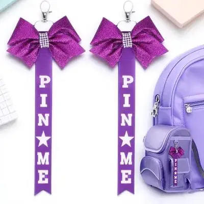 

2Pcs Cheer Keychains Bow Ribbon Rhinestone Cheerleader Pin Me Ribbon Bow Charm for Bags Backpacks Pin Me Cheer Keychain