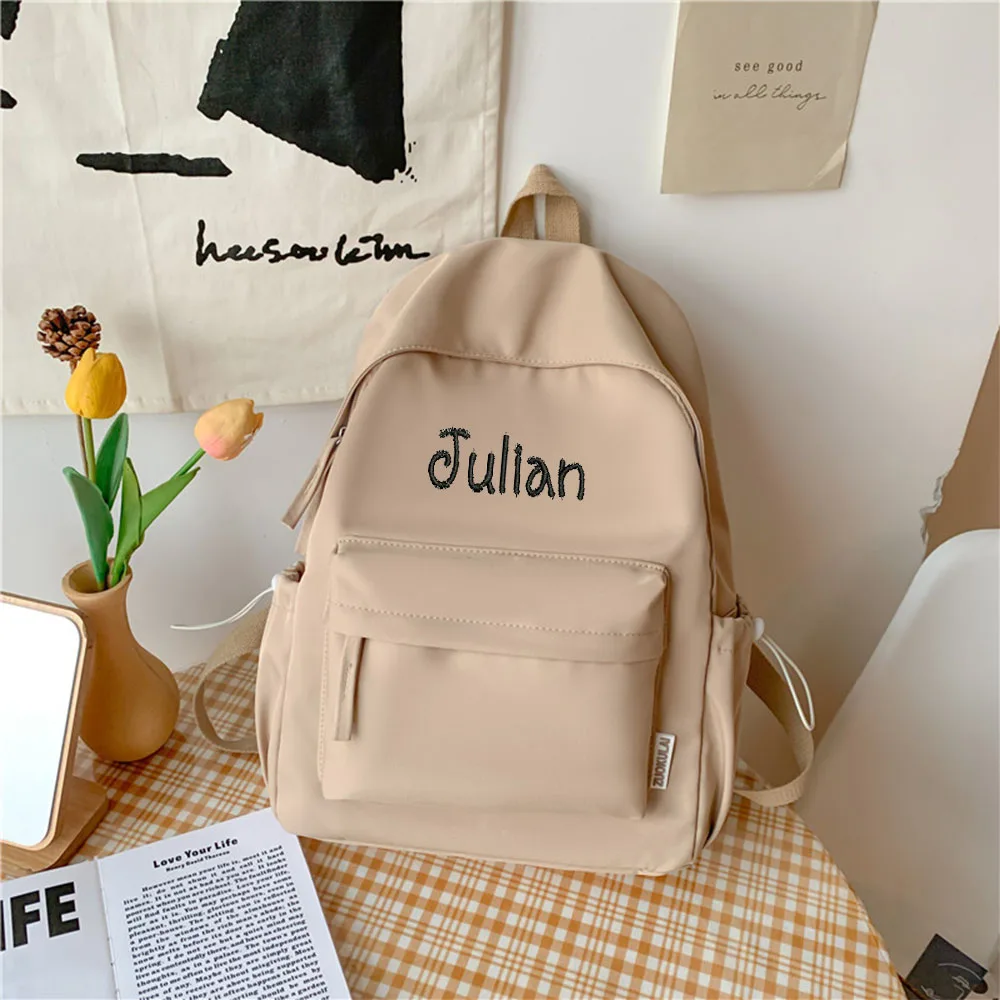 

Embroidered with any name simple solid color casual versatile backpack, travel backpack, large capacity student backpack