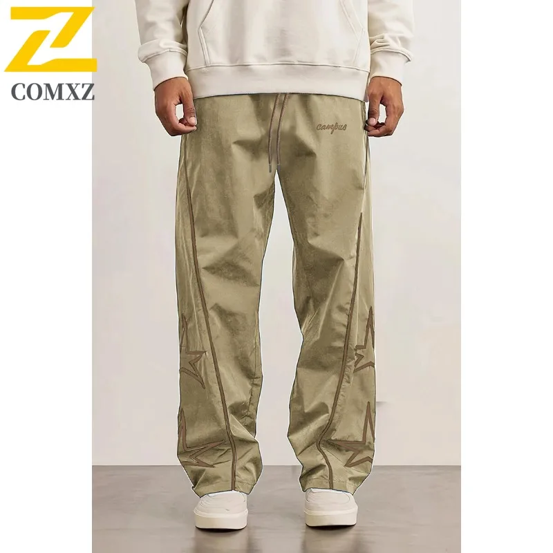 

COMXZ American Sports Pants Men 2025 Spring Autumn Fashion Printed Loose Trousers Street Clothing Casual Wide Leg Cargo Pants