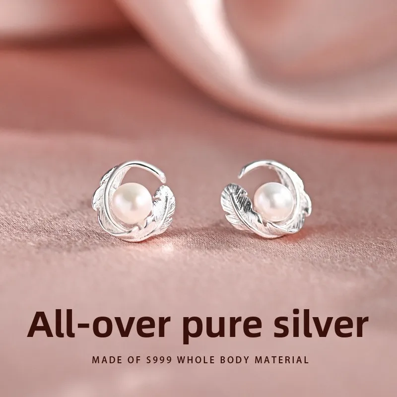 

S999 silver simple and fashionable women's feather freshwater pearl earrings commuting niche design temperament earrings