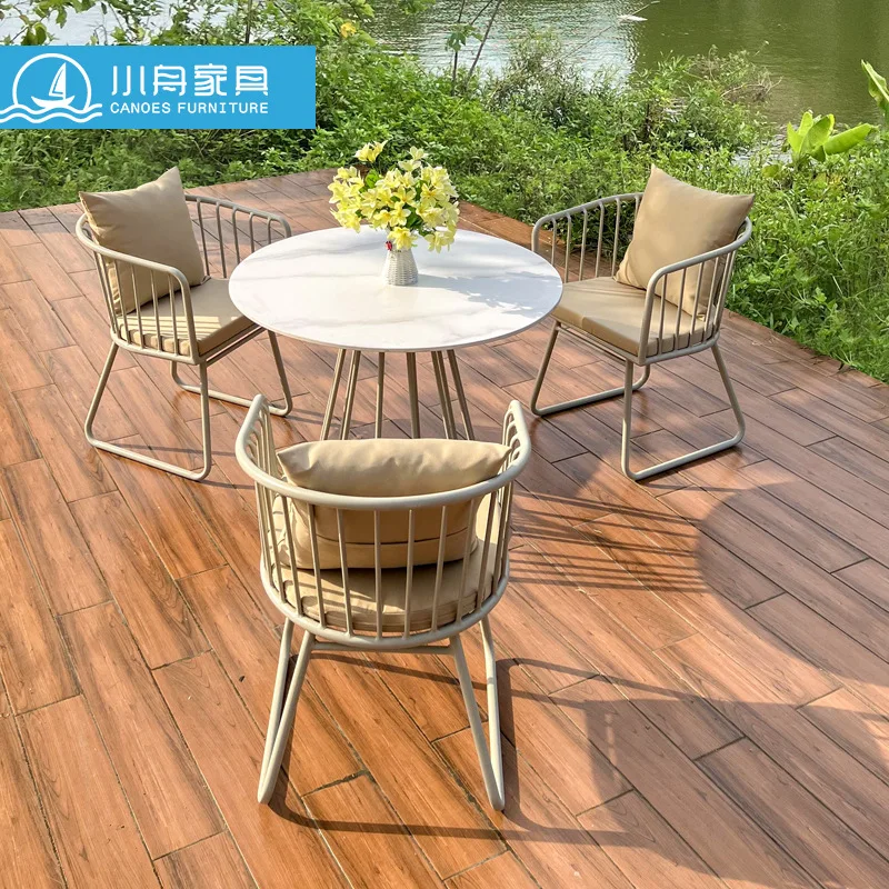 Outdoor courtyard garden metal table and chair coffee shop creative waterproof sun-proof iron chair tea table combination