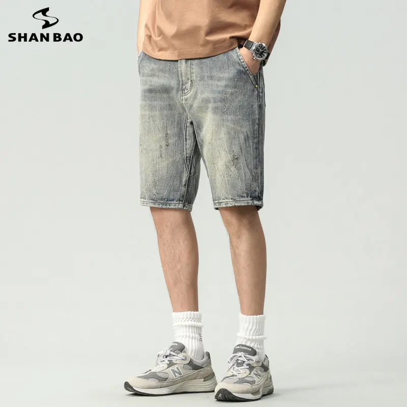 

2023 Summer New Men's Vintage Washable Shorts Street Hip Hop Perforated Loose Fitting Shorts Fashion Knee Length Capris