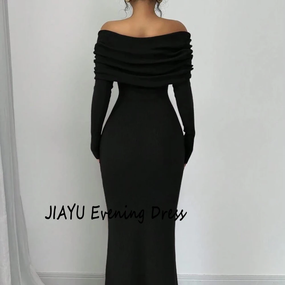 فستان سهرة رسمي من الجيرسيه برقبة قارب أسود مخصص مطوي وأكمام طويلة رداء حفلات بطول الكاحل حورية البحر فستان حفلة موسيقية للنساء