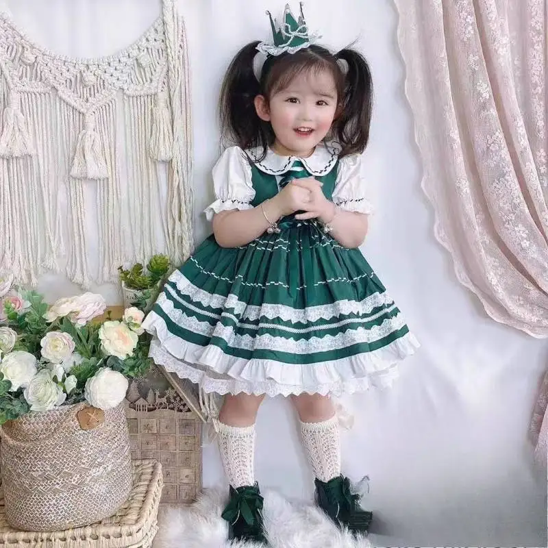 Niedliches Dienstmädchen-Kostüm für Kleinkinder im Lolita-Stil mit weißer Spitzenschürze, grünen Puffärmeln und gestuften Rüschen für Kinder-Feenkostüme – Detail 6