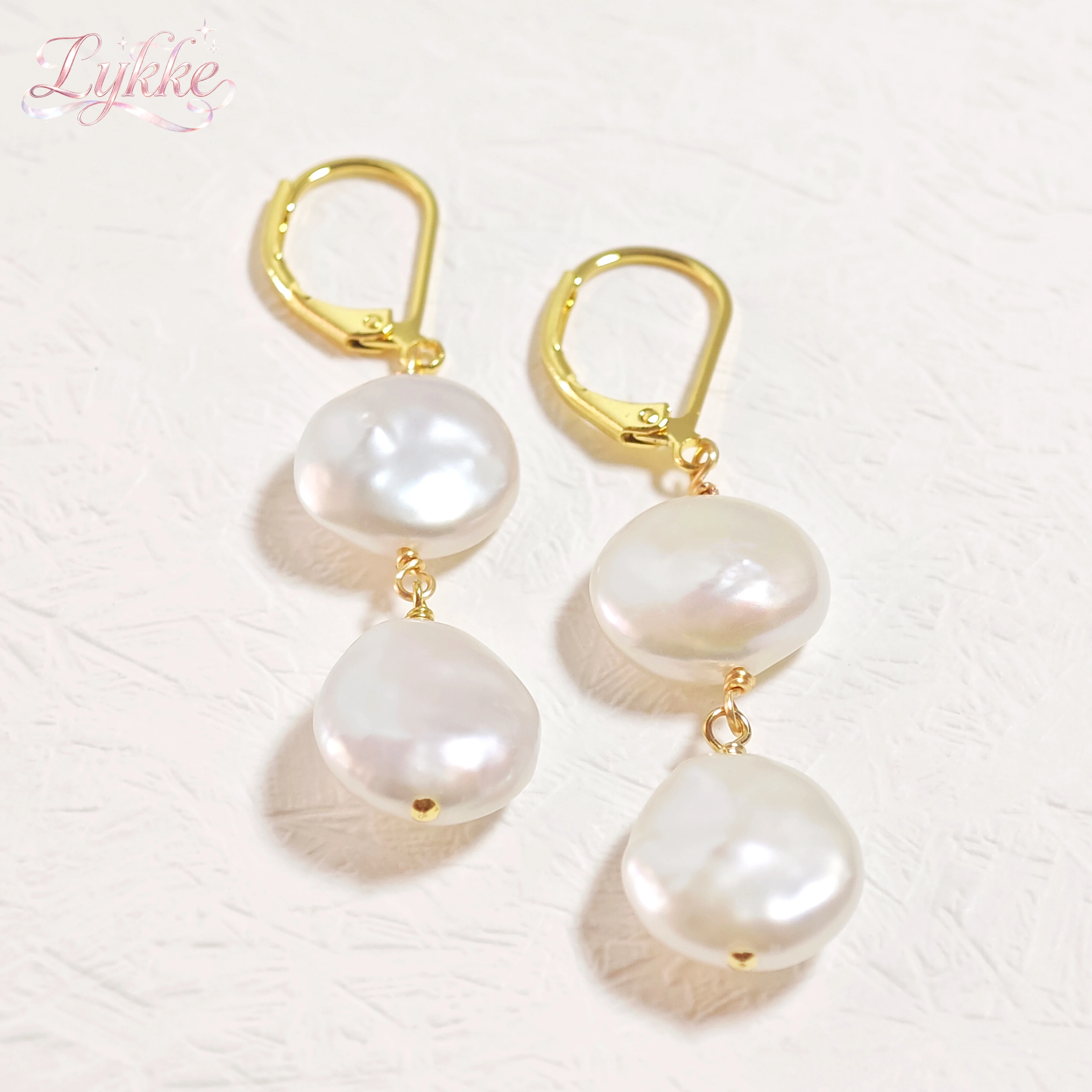 

Hot selling natural freshwater pearl earrings fashionable women's pendant earrings Baroque pearl 18K gold-plated party wedding