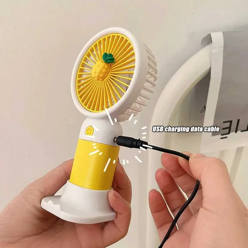 Simpatico Mini ventilatore a mano con frutta con supporto per telefono, dispositivo di raffreddamento estivo all'aperto, ventilatore portatile ricaricabile USB per tasca per studenti