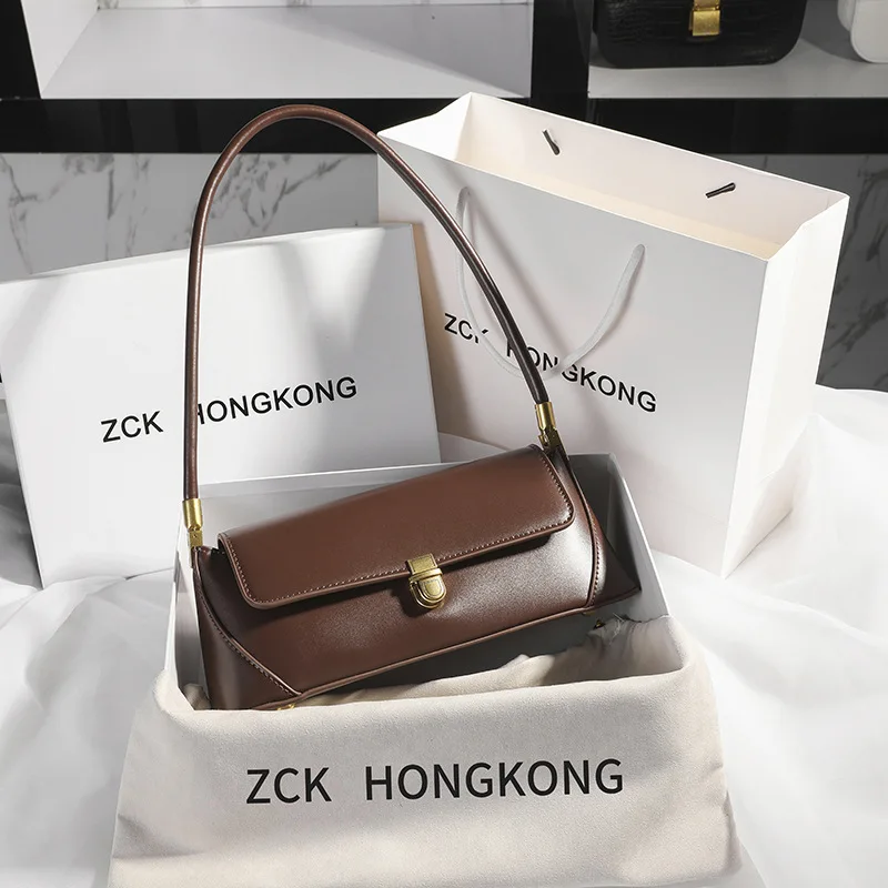 bag retro niche design high-end sense solid color single shoulder portable leather women's bag spring and summer versatile
