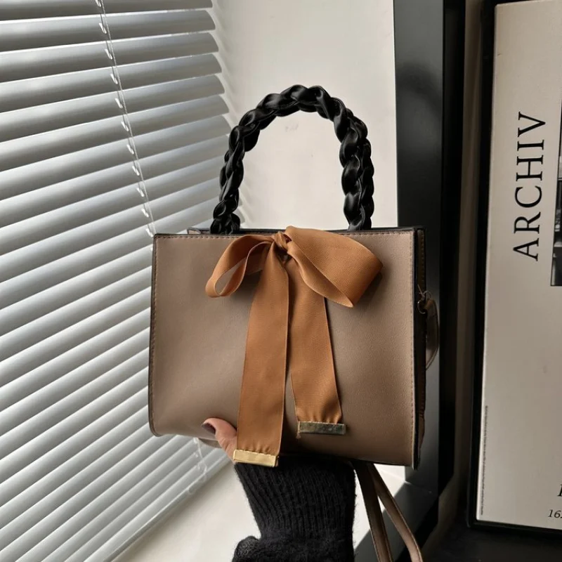 

High-End Designer Women Handbag With Iconic Buckle Detail And Leather Construction For A Statement Look