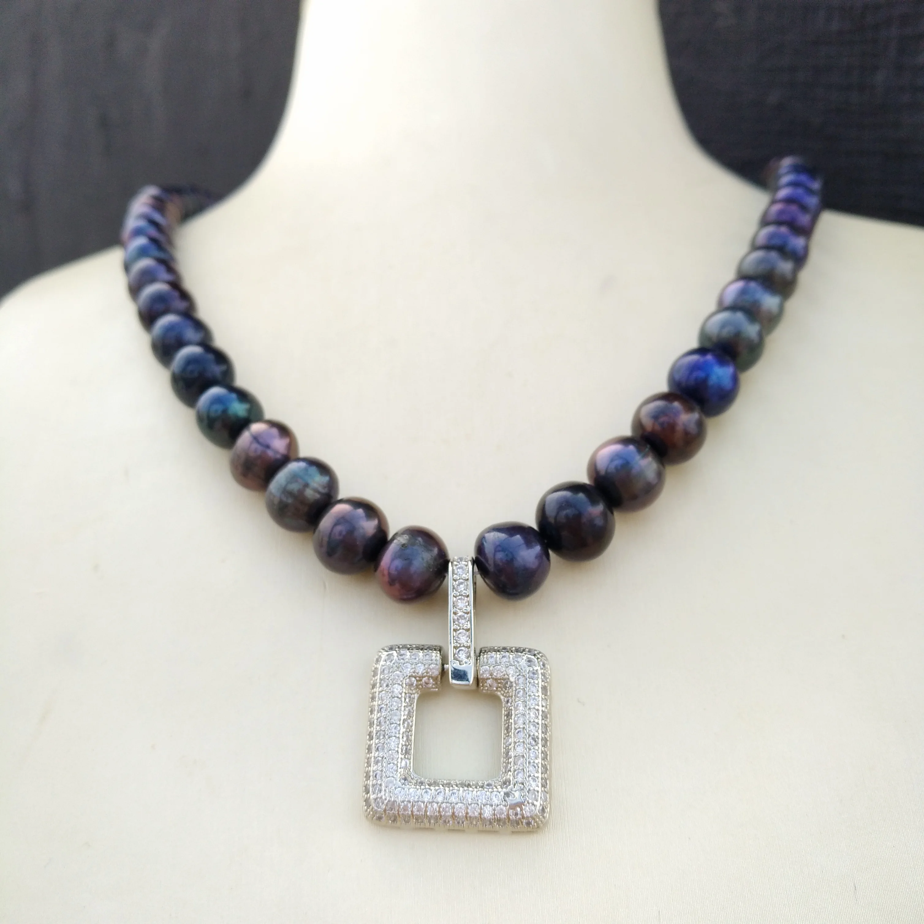 

Excellent REAL natural south sea Black pearl necklace pendant Please see more photos with pearl details.