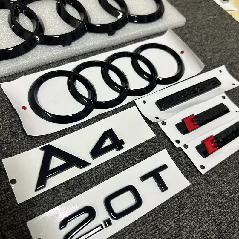 The new ABS letter 3D sticker Quattro Sline 2.0T is suitable for the modification of Audi A4 2008-2017 glossy black suitcase.
