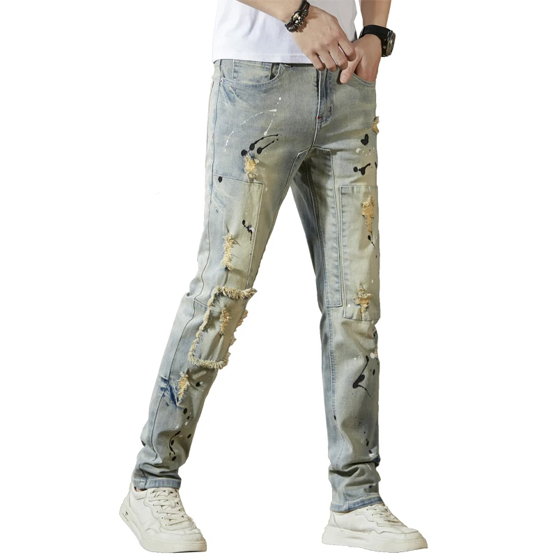 High quality stretch jeans retro and nostalgic splashed with ink spliced with patchwork fabric ripped motorcycle pants for men