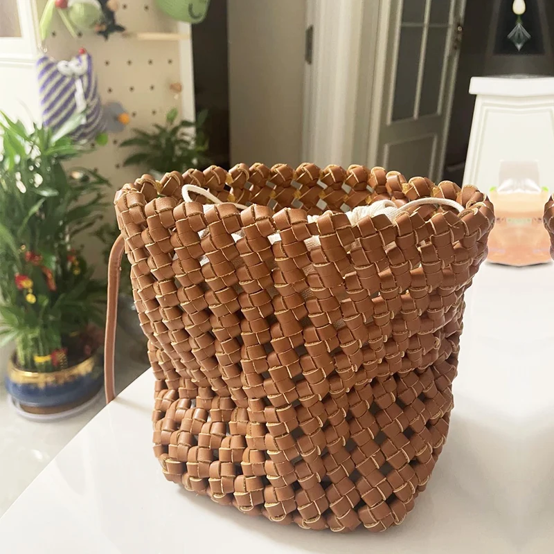 

Hand Woven Mini Bucket Bags For Women Luxury Designer Handbags And Purses 2025 New In PU hollow Out Decoration Underarm Shoulder