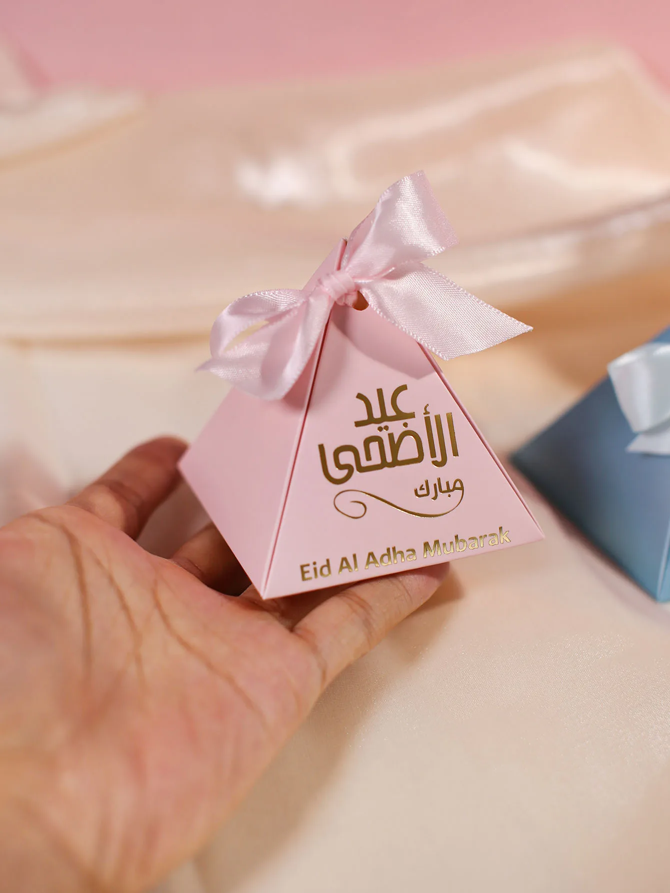 Eid al Adha candy box, holiday celebration gift box, decorated with Muslim hot stamping font, conveying good wishes