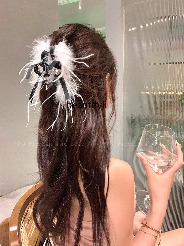 

Pure Desire Style White Feather Love Heart Bow Tie Grip Female High-Grade Temperament Back Head Updo Shark Clip