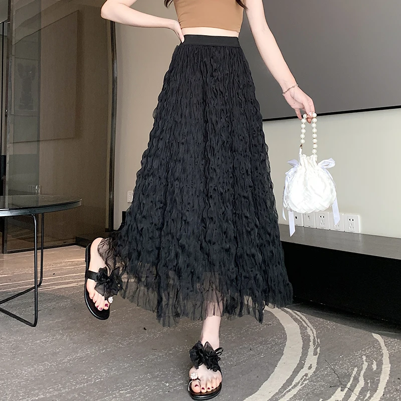 Mesh half skirt for women in spring and summer, new casual high waisted slimming and versatile wrinkled wave long skirt