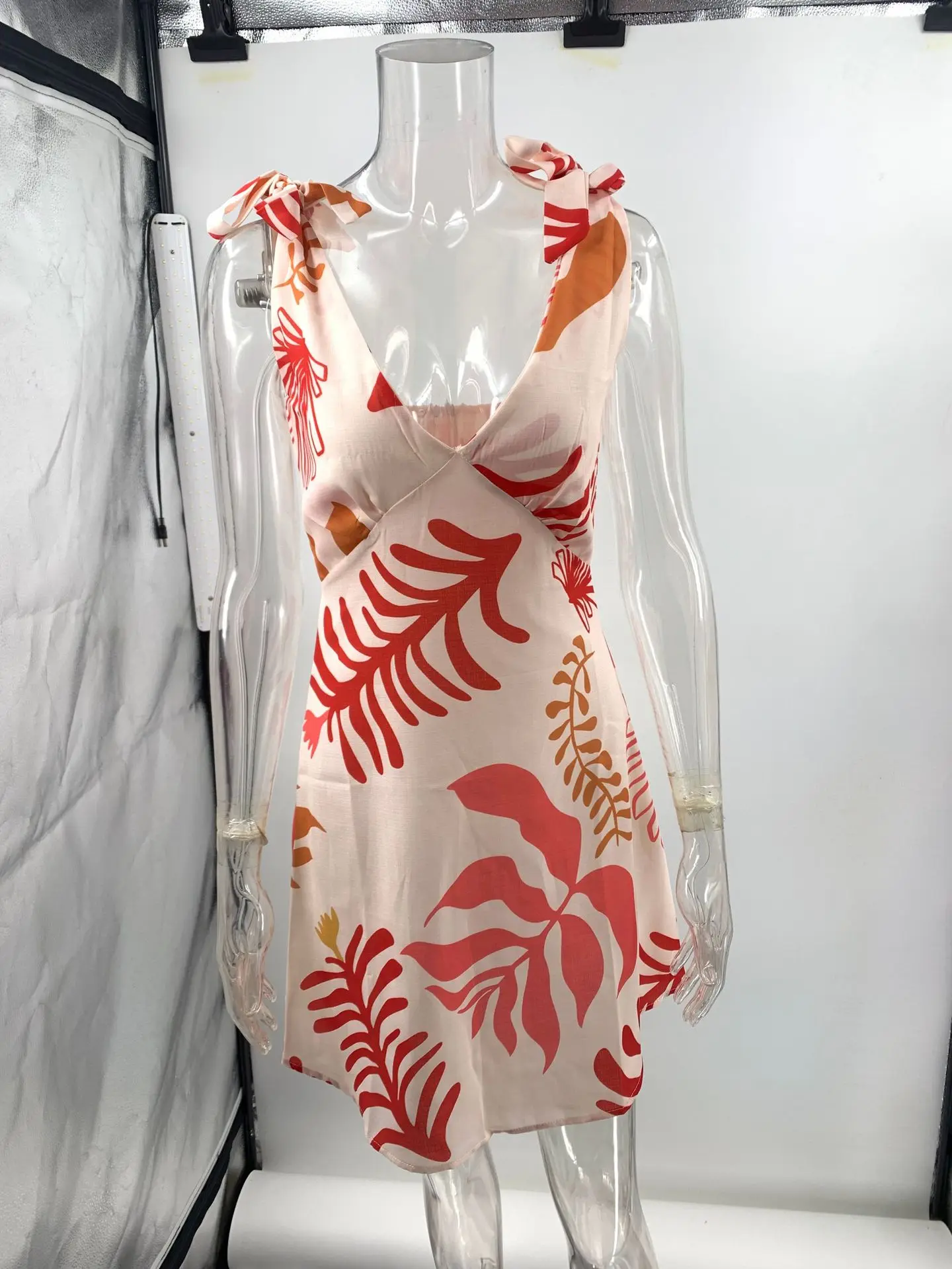 Minivestido sin mangas con cuello en V para mujer, vestido Sexy con tirantes y lazo estampado, Falda corta para fiesta y playa, moda de verano