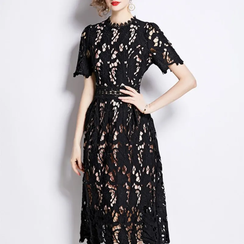 2025 Nieuwe hoogwaardige borduurkant holle jurken Damesjurken met O-hals en korte mouwen