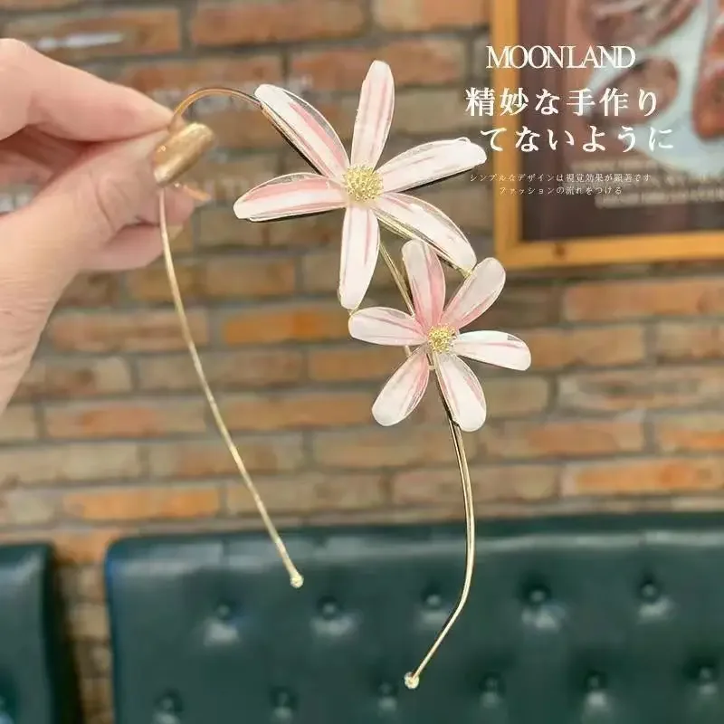 Рисунок 3 - Новые повязки на голову с цветком