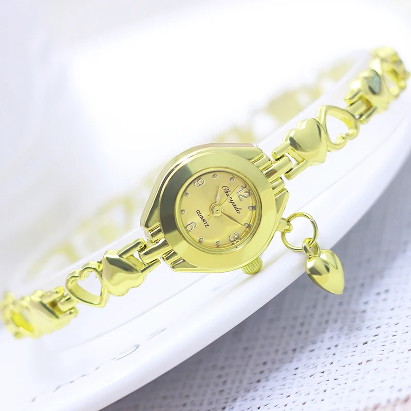 new woman's lady young girls fashion Alloy Heart Hollow Love Pendant quartz bracelet wristwatch female thin gold luxury watches