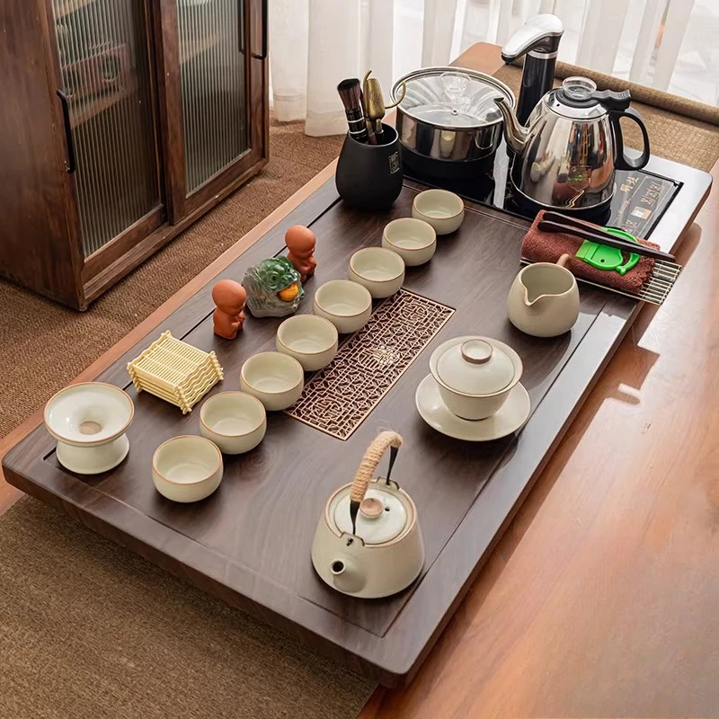 A complete set of kung fu tea set home living room automatic boiling water integrated tea tray teacup teapot