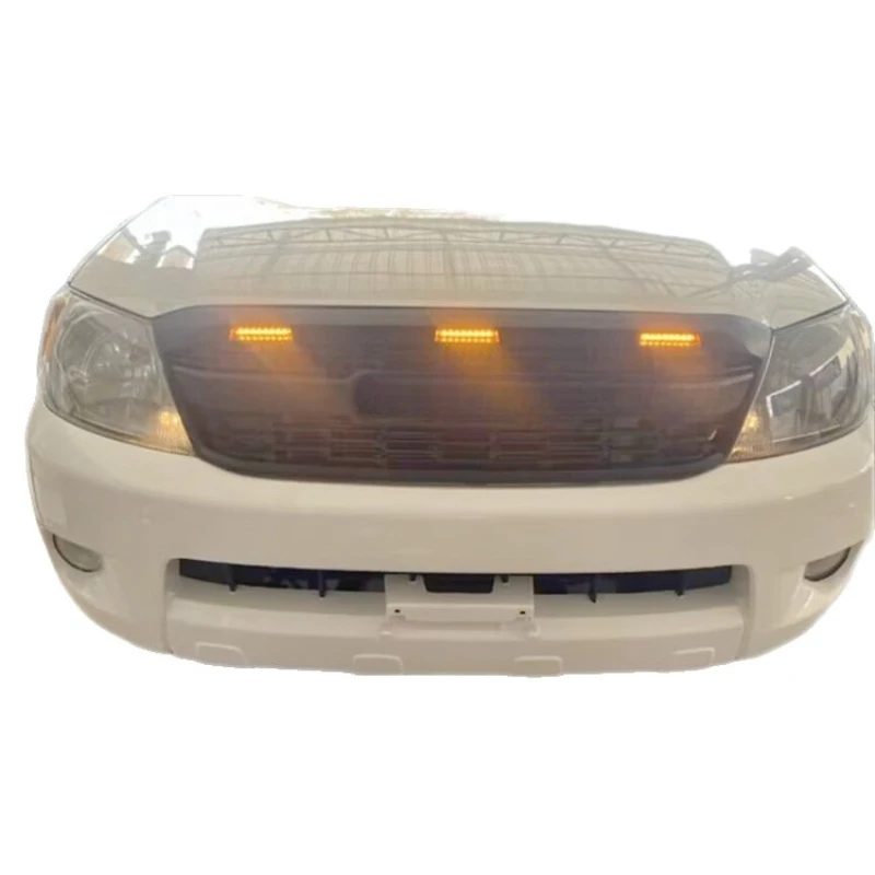 

Suitable for 05-14 HILUX VIGO pickup truck modified China Grid with lights on the front face