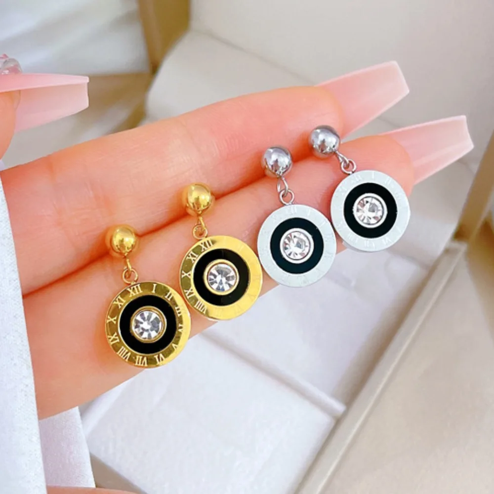 

Cold metal style stainless steel earrings, fashionable Roman numeral design pendant, sparkling zircon. Ladies' Christmas gifts.