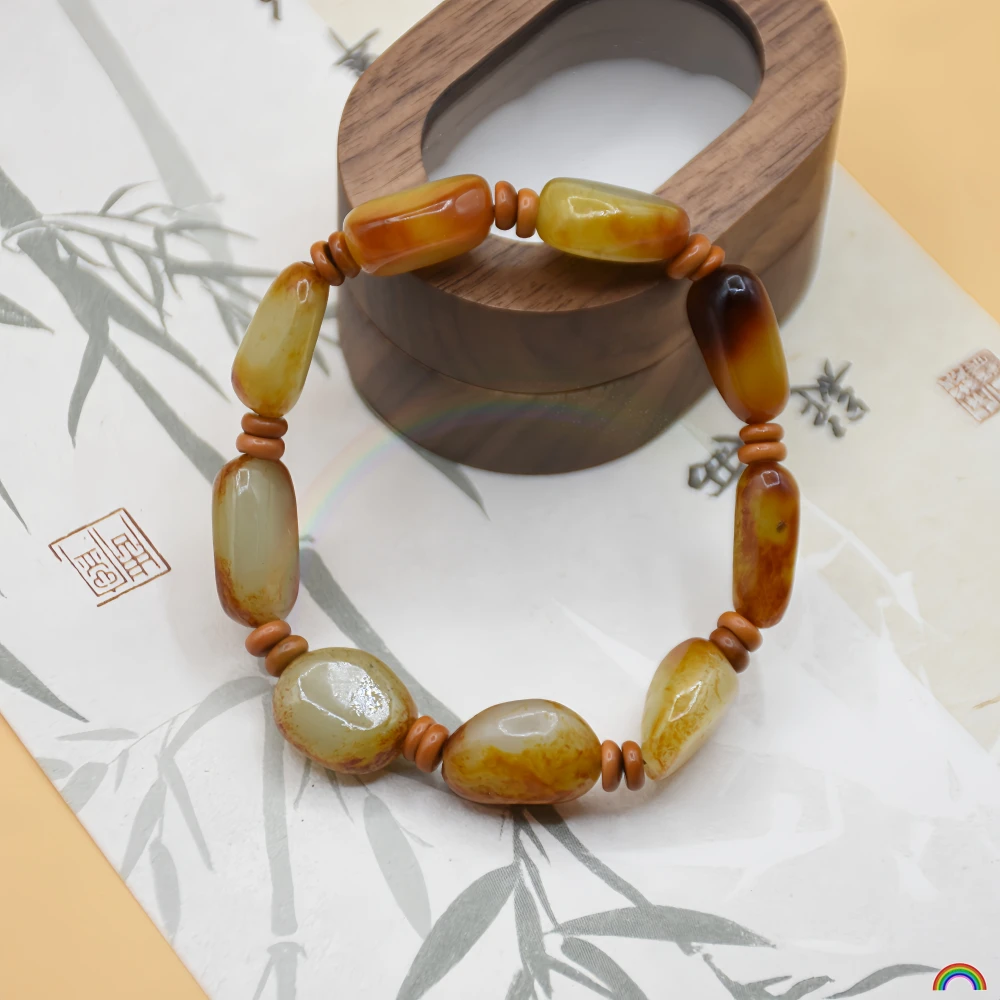 

Natural Xinjiang Hotan Jade Seed Hand String Raw Stone Red Qin Skin Shaped Jade Bracelet Rwbuy Brand Design
