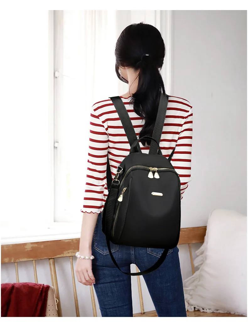 A stylish new women's backpack with a high-end feel, a casual outdoor travel small backpack and a fashionable commuting hand bag
