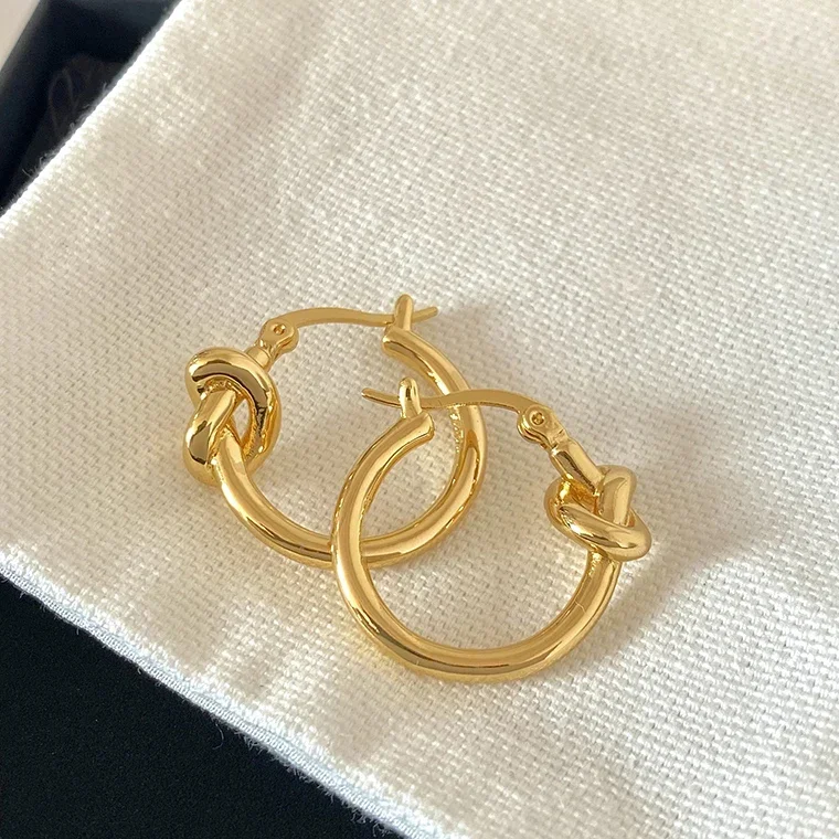 

2026 Fashion Designer Brand Small Circle Knotted 18K Gold Silver Earrings Women Top Quality Luxury Jewelry Trend