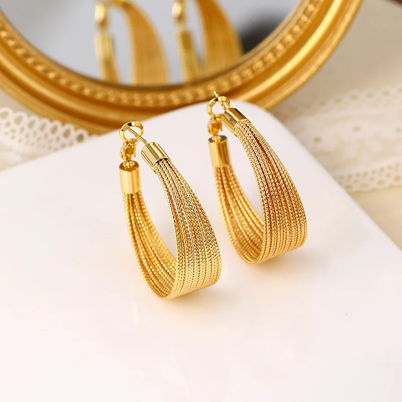 

Gold Tone Earrings for Women, 2026 New Model, Bold Size or 3D Shape, Metal Construction, Eye-Catching