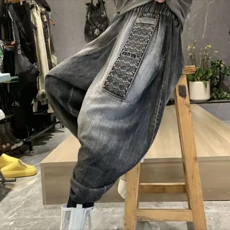 Calças de brim femininas soltas casuais algodão denim grande bolso tornozelo comprimento calças rebite design harem calças 2025 novo outono estilo streetwear