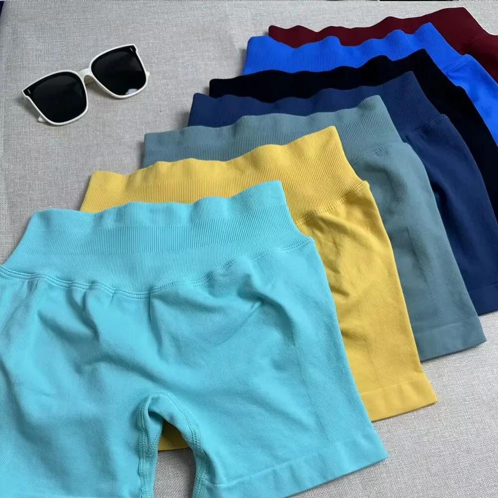 Pantalones cortos sin costuras para mujer, pantalones cortos de gimnasio con cintura baja acanalada, pantalones cortos de Yoga para levantamiento de glúteos, pantalones cortos para correr y bicicleta de estiramiento alto