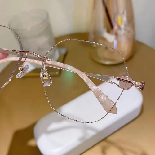 Imagen 2 del producto Gafas antiazules a la moda para mujer, gafas graduadas sin montura, titanio, personalizadas, hipermetropía, miopía, corrección óptica de astigmatismo